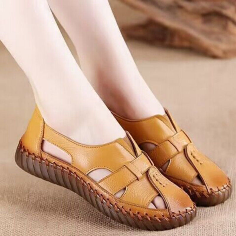 Sandalias planas de piel de vaca