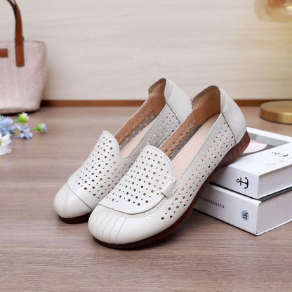 Zapatos de cuero huecos de suela blanda