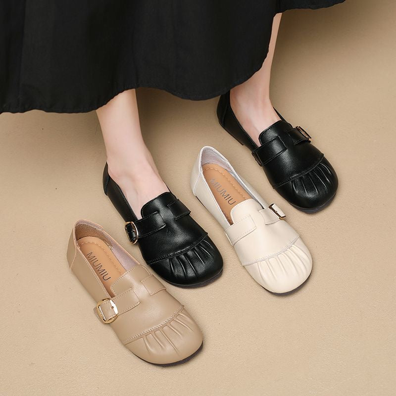 Zapatos de piel plisados con punta redonda