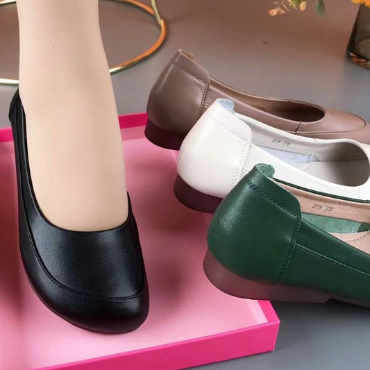 Zapatos sencillos de cuero con punta redonda