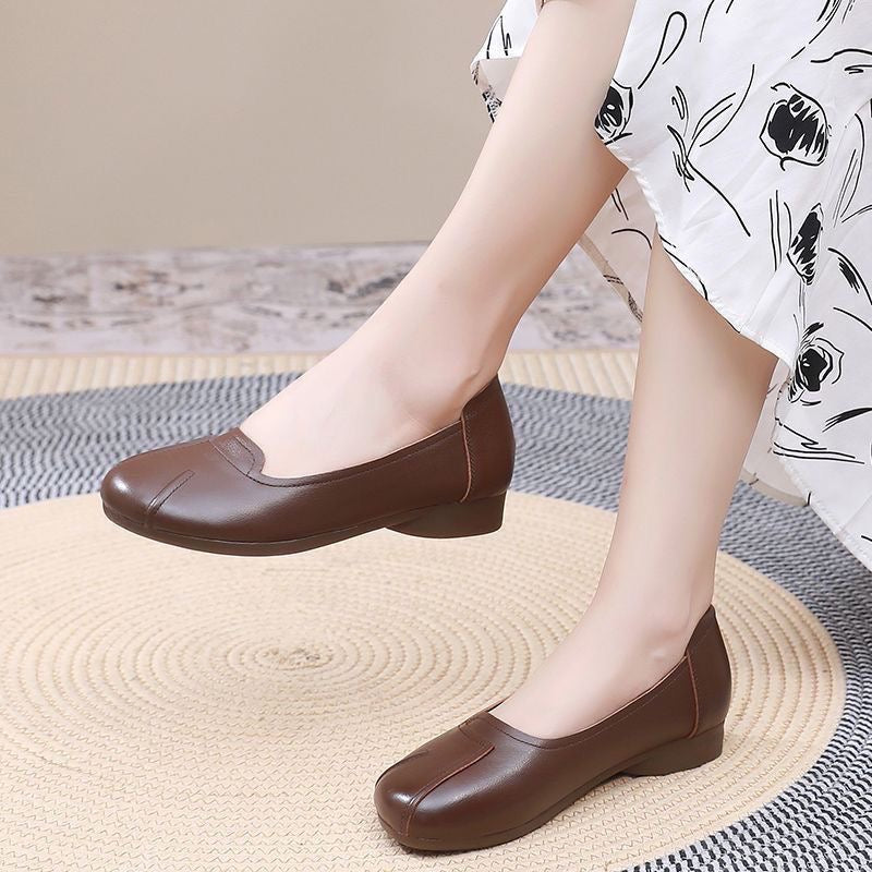 Zapatos cómodos de cuero con suela blanda y punta redonda