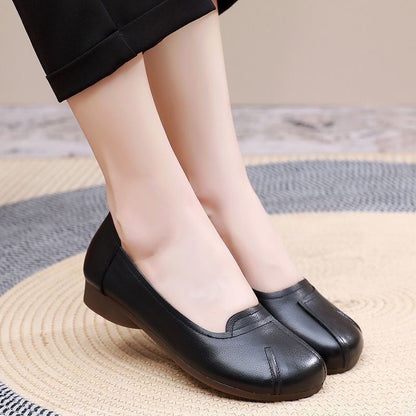 Zapatos cómodos de cuero con suela blanda y punta redonda