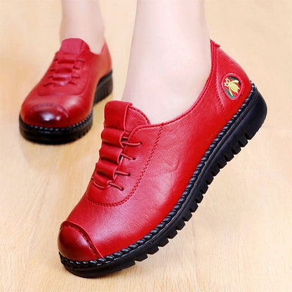 Zapatos de piel con suela blanda bordados