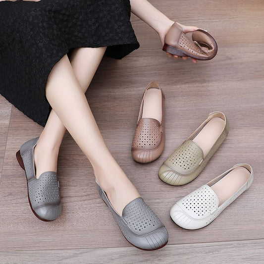 Zapatos de cuero huecos de suela blanda