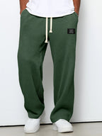 https://cdn.shopify.com/s/files/1/0981/1568/2584/files/Jogger-Broek-Heren-Relaxte-Pasvorm-Tijdloze-Stijl-9.jpg?v=1787116601