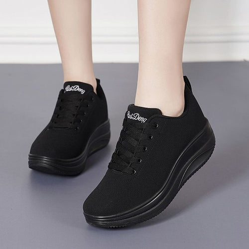 Hardloopschoenen met veters en een ronde neus