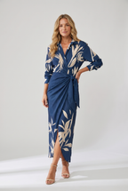 https://cdn.shopify.com/s/files/1/0981/1568/2584/files/womens-dress-leaf-print-maxi-wrap-v-neck__model_01_front.png?v=1787074023