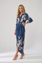 https://cdn.shopify.com/s/files/1/0981/1568/2584/files/womens-dress-leaf-print-maxi-wrap-v-neck__model_02_threequarter.jpg?v=1787074022